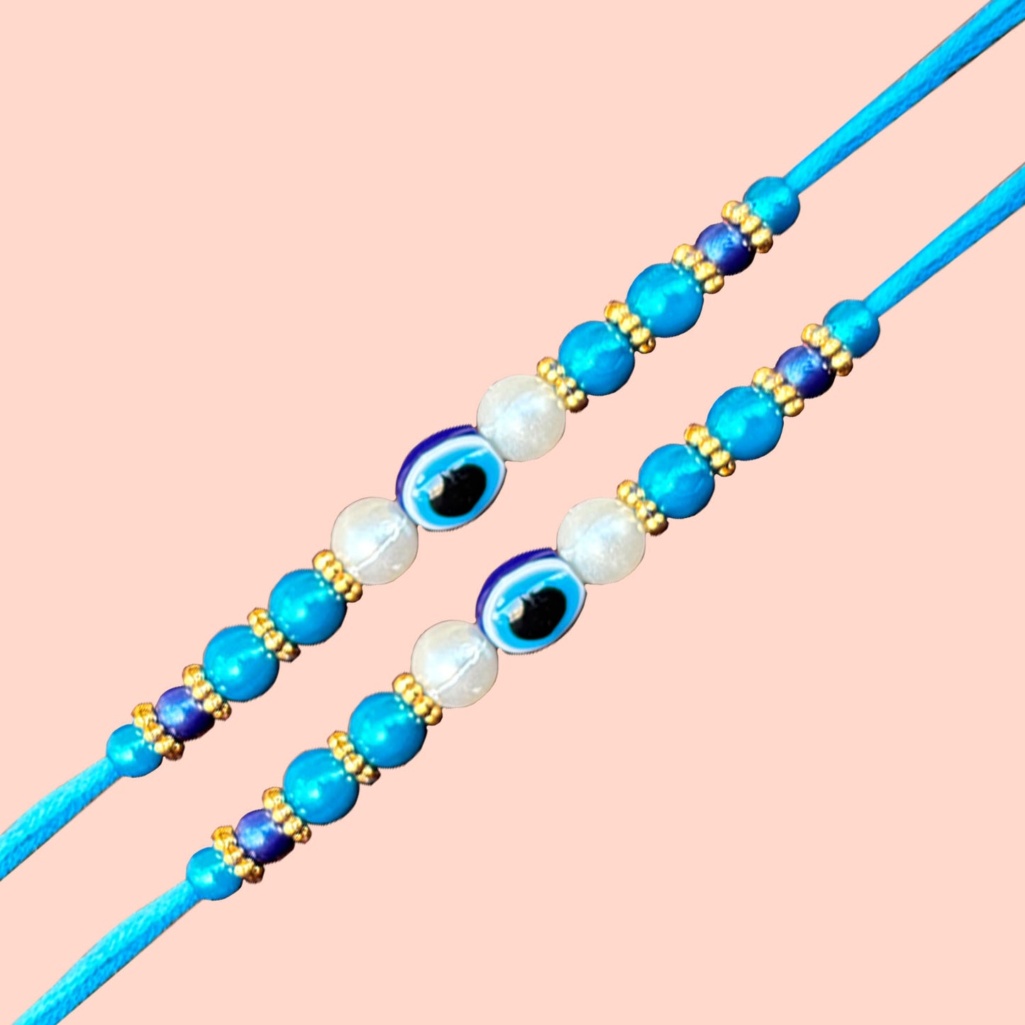 AWANI TRENDS Evil Eye 2 Rakhi with Greeting card Roli Chawal